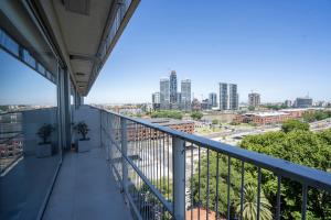 a balcony with a view of the city at Quartier Puerto Urbano in Buenos Aires