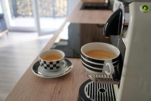 Příslušenství pro přípravu čaje a kávy v ubytování Stilvolle Auszeit - moderne Ferienwohnung in Hachenburg + 9 fotografií