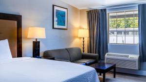 Ένα ή περισσότερα κρεβάτια σε δωμάτιο στο Motel 6 - Aberdeen, WA +51 φωτογραφίες