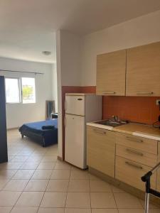 Η κουζίνα ή μικρή κουζίνα στο Central Studio Apartment near beach