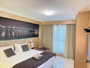 Ένα ή περισσότερα κρεβάτια σε δωμάτιο στο Cullinan Brasilia - Fabuloso apartamento da REDE PREMIUM 05 +11 φωτογραφίες