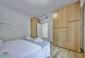 Ένα ή περισσότερα κρεβάτια σε δωμάτιο στο Casa Giuditta with Air Conditioning and Pool +25 φωτογραφίες