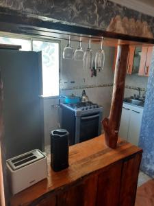 Kuchyň nebo kuchyňský kout v ubytování Cabaña recinto Super vista, WIFI con terraza3