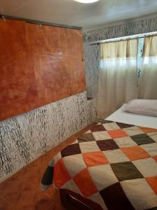 Postel nebo postele na pokoji v ubytování Cabaña recinto Super vista, WIFI con terraza3 + 1 fotografie