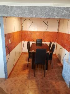 Posezení v ubytování Cabaña recinto Super vista, WIFI con terraza3