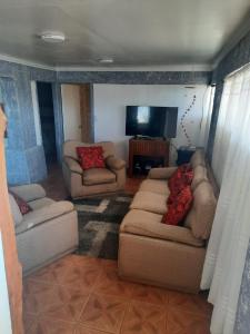 Posezení v ubytování Cabaña recinto Super vista, WIFI con terraza3