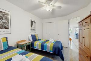 Postel nebo postele na pokoji v ubytování South Beach 43