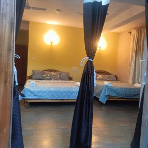 Postel nebo postele na pokoji v ubytování SL Guest House + 1 fotografie