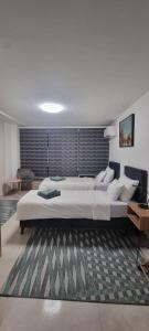 Ένα ή περισσότερα κρεβάτια σε δωμάτιο στο Apartman Bedem +13 φωτογραφίες