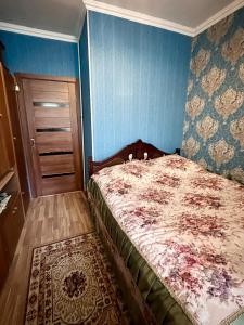 Postel nebo postele na pokoji v ubytování Apartment close to the boulevard