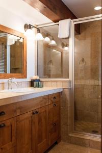 a bathroom with a sink and a shower at Spacious 4BR home in Steamboat Springs, perfect for family getaways! in Steamboat Springs