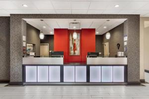 a lobby of a hospital with red and purple at Best Western Plus Laredo Inn & Suites in Laredo +49 photos