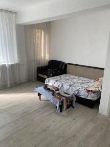 Postel nebo postele na pokoji v ubytování Ploiești Centru