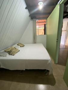 Postel nebo postele na pokoji v ubytování Chale Hostel Do Indio + 8 fotografií