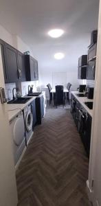 Kuchyň nebo kuchyňský kout v ubytování The Woodside