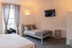 Postel nebo postele na pokoji v ubytování The Woodside + 9 fotografií