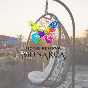 a butterfly hanging from a swing at a hotel reservema monarc at Hotel Reserva Monarca in Salento +75 photos