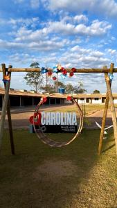 a hula hoop in front of a building at Carolina Palace HOTEL in Carolina