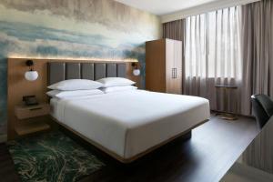 Ένα ή περισσότερα κρεβάτια σε δωμάτιο στο Buffalo Marriott Niagara +29 φωτογραφίες