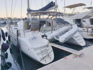 a couple of boats docked in a harbor at Catamaran Jaso in Jadranovo