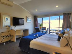 Televiisor ja/või meelelahutuskeskus majutusasutuses U Residence Hotel, Signature Collection by BW