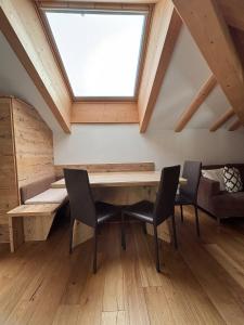 Χώρος καθιστικού στο Pragma Apartments - Wood Lodge Predazzo +6 φωτογραφίες