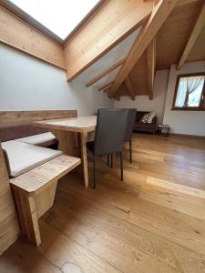 Χώρος καθιστικού στο Pragma Apartments - Wood Lodge Predazzo