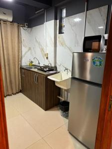 Η κουζίνα ή μικρή κουζίνα στο Los Monges Aparthotel