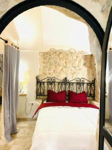 Ένα ή περισσότερα κρεβάτια σε δωμάτιο στο Casa Dea - Bungalow Apollon