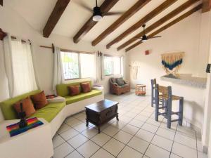 a living room with a couch and a table at Hotel de Asis in San Francisco