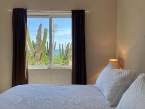 Postel nebo postele na pokoji v ubytování Casita Sol