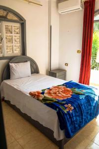 Ένα ή περισσότερα κρεβάτια σε δωμάτιο στο Pauline Guest House +44 φωτογραφίες