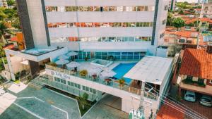 an overhead view of a building with a swimming pool at Bali Mar Hotel in Natal