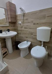 Koupelna v ubytování S'apposentu 'e Santa Ruche + 5 fotografií