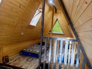 an overhead view of a bedroom in a tree house at М'юзіка Карпат in Yavoriv