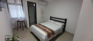 Ένα ή περισσότερα κρεβάτια σε δωμάτιο στο Hotel Habibi inn Baq