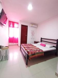 Ένα ή περισσότερα κρεβάτια σε δωμάτιο στο Hotel Habibi inn Baq