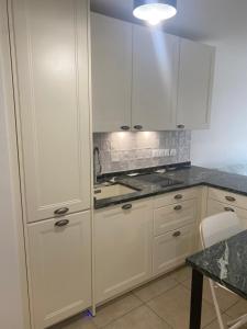 Køkken eller tekøkken på Carré Haussmann avec parking + 2 billeder