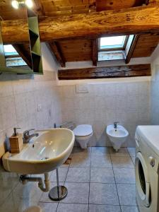 Koupelna v ubytování Il Campo sul Lago + 13 fotografií