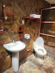 Koupelna v ubytování Ecolodge ILLAMPU