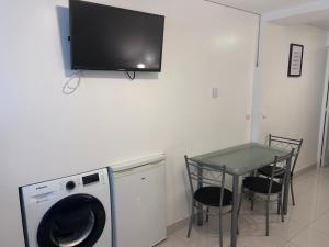 Η κουζίνα ή μικρή κουζίνα στο Séjour magique entre Paris et Disney