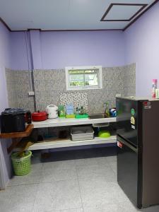 Kuchyň nebo kuchyňský kout v ubytování Cha Bungalow