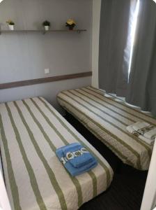 Ένα ή περισσότερα κρεβάτια σε δωμάτιο στο Sesimbra 3 Bedrooms with Shared Pool