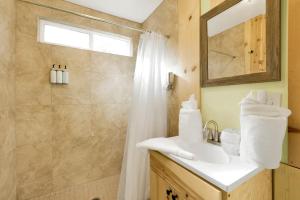 a bathroom with a sink and a shower at Sugar Bear Chalet #2559 in Sugarloaf +18 photos