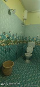 Koupelna v ubytování Shree chendur Residency Roomstay