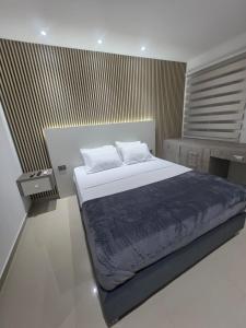 Postel nebo postele na pokoji v ubytování Luxury Park 35