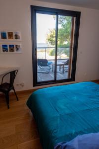 Postel nebo postele na pokoji v ubytování La Franqui Vue Mer Exceptionnel + 48 fotografií