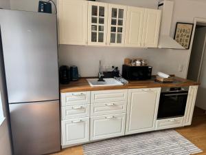 Η κουζίνα ή μικρή κουζίνα στο Luxury Cosy apartment in Bonn +7 φωτογραφίες