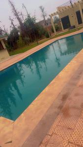 Bazén v ubytování Villa bnssasi nebo v jeho okolí