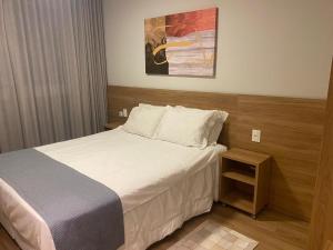 Postel nebo postele na pokoji v ubytování Flat 102 Conforto e Charme + 23 fotografií